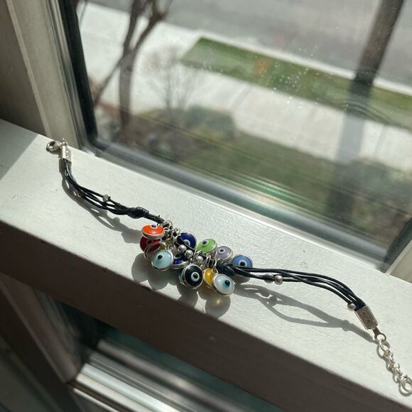 Beautiful pleather bracelet with colored evil eye pendants - Picture 1 of 5